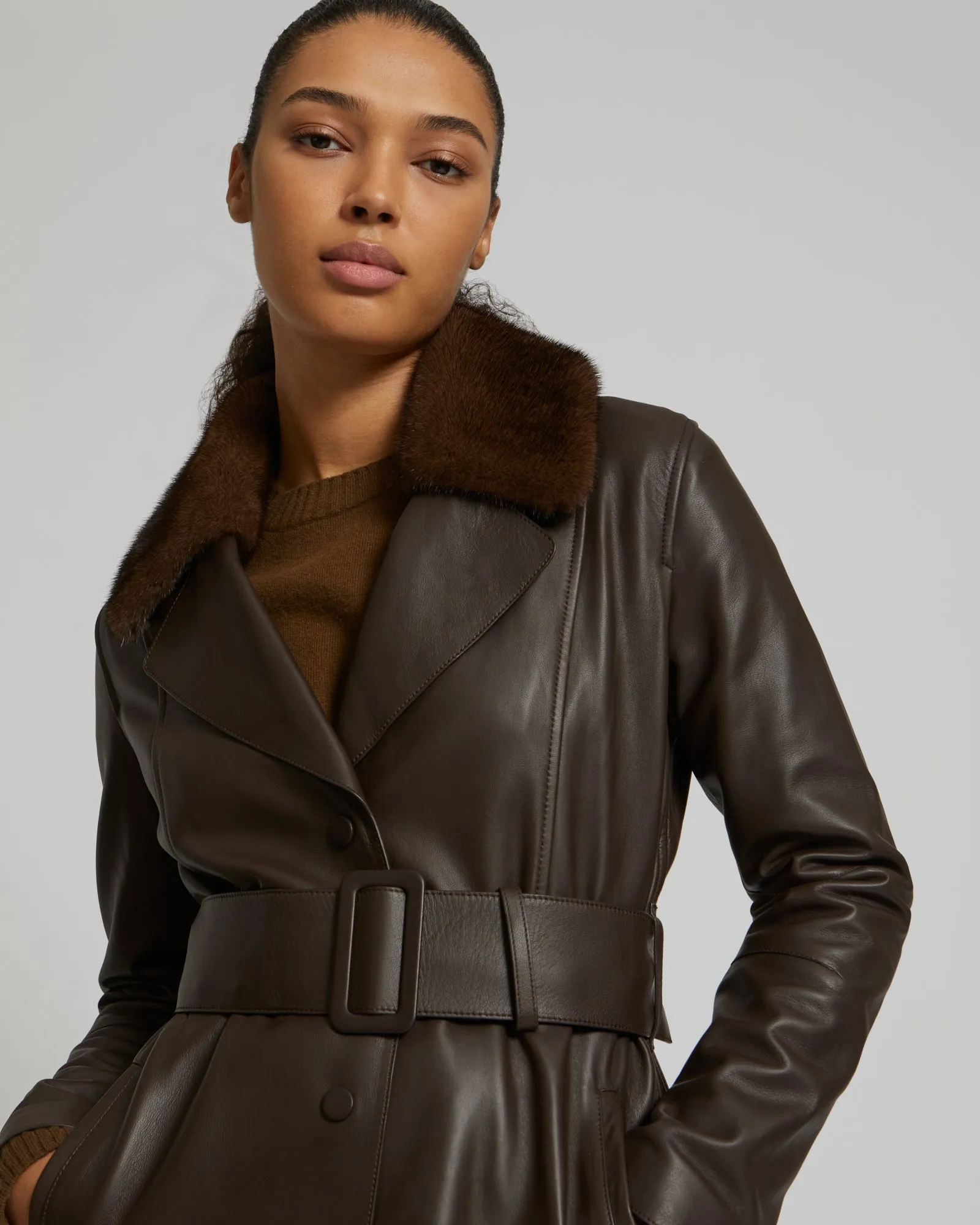 Lamb leather coat with a mink fur collar