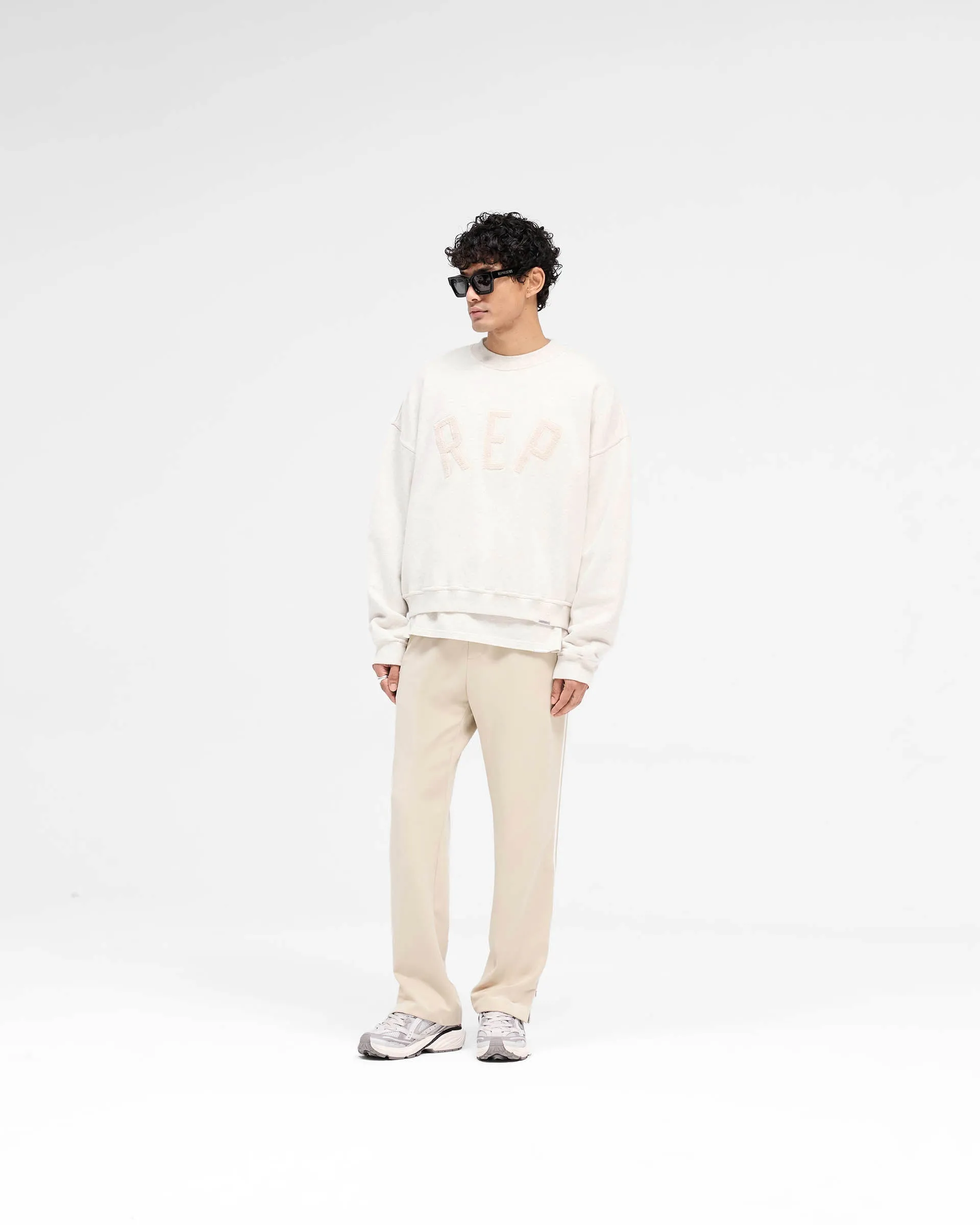 Rep Applique Sweater - Cream Marl