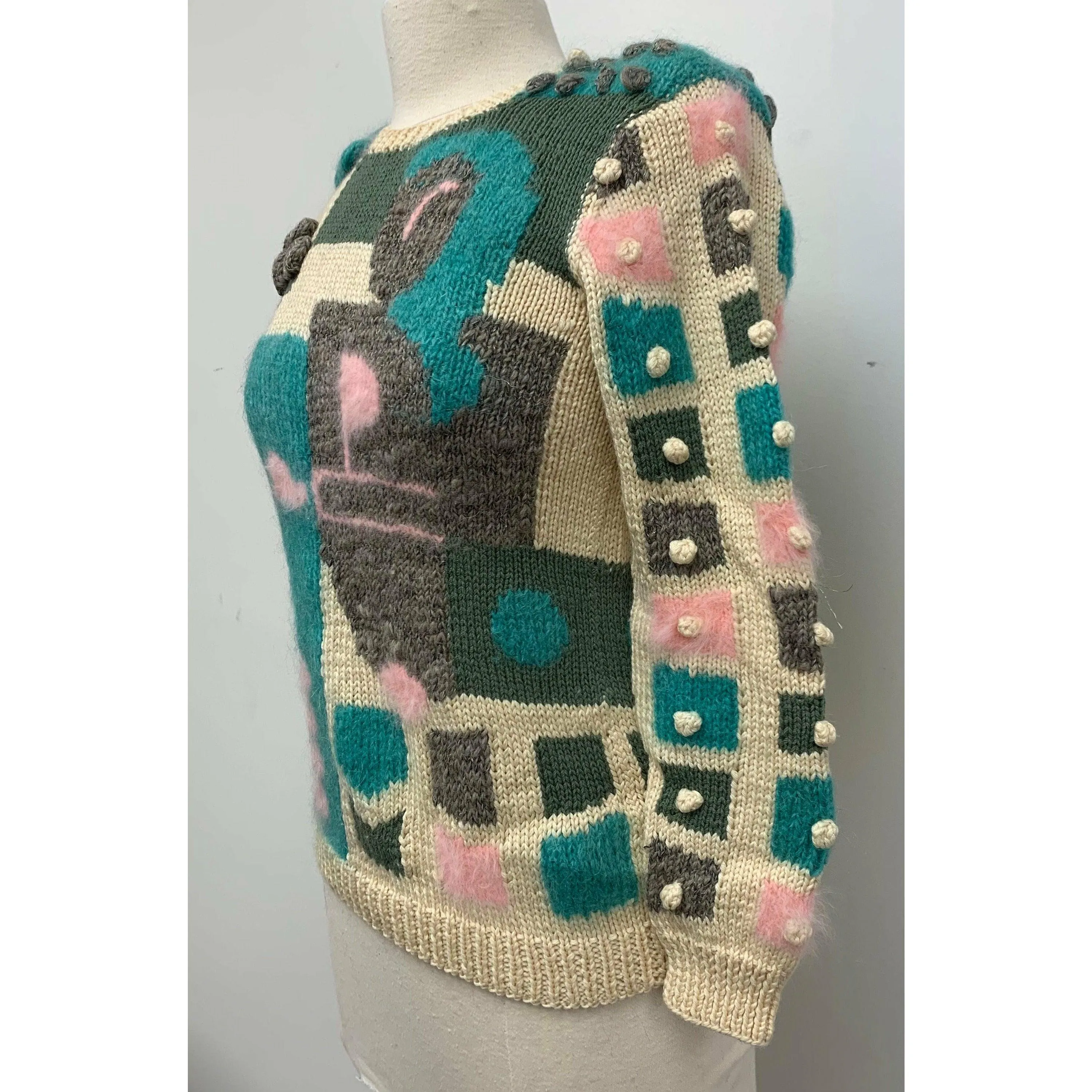 Womens 1980s hand knit pullover sweater. Couture yarns. Intricate knitting on small needles.  SMALL